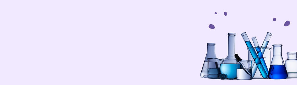 A pastel purple background with an image of lab beakers and tubes filled with liquid.